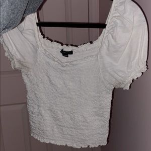 White puffy sleeved top